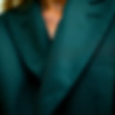 Textured Detail of Dark Green Blazer Close-up of a textured dark green fabric