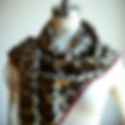 Elegant leopard print scarf draped over a mannequin